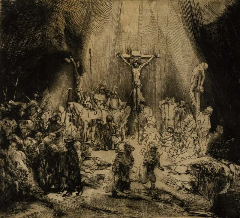 Aguafuerte de Rembrandt: Cristo crucificado entre los dos ladrones, bajo un haz de luz, con la multitud al pie de las cruces