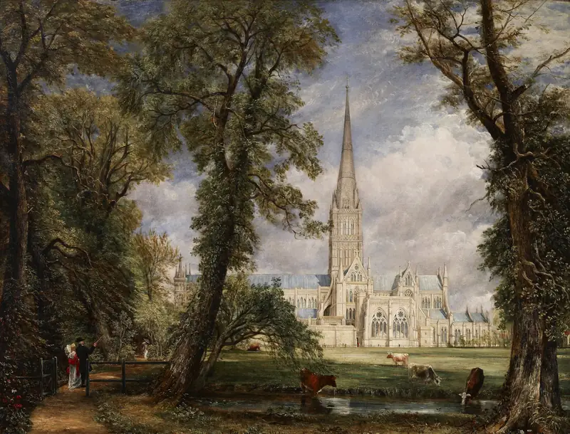 Catedral de Salisbury con su aguja gótica, vista entre altos árboles desde el jardín del obispo, con vacas junto a un arroyo